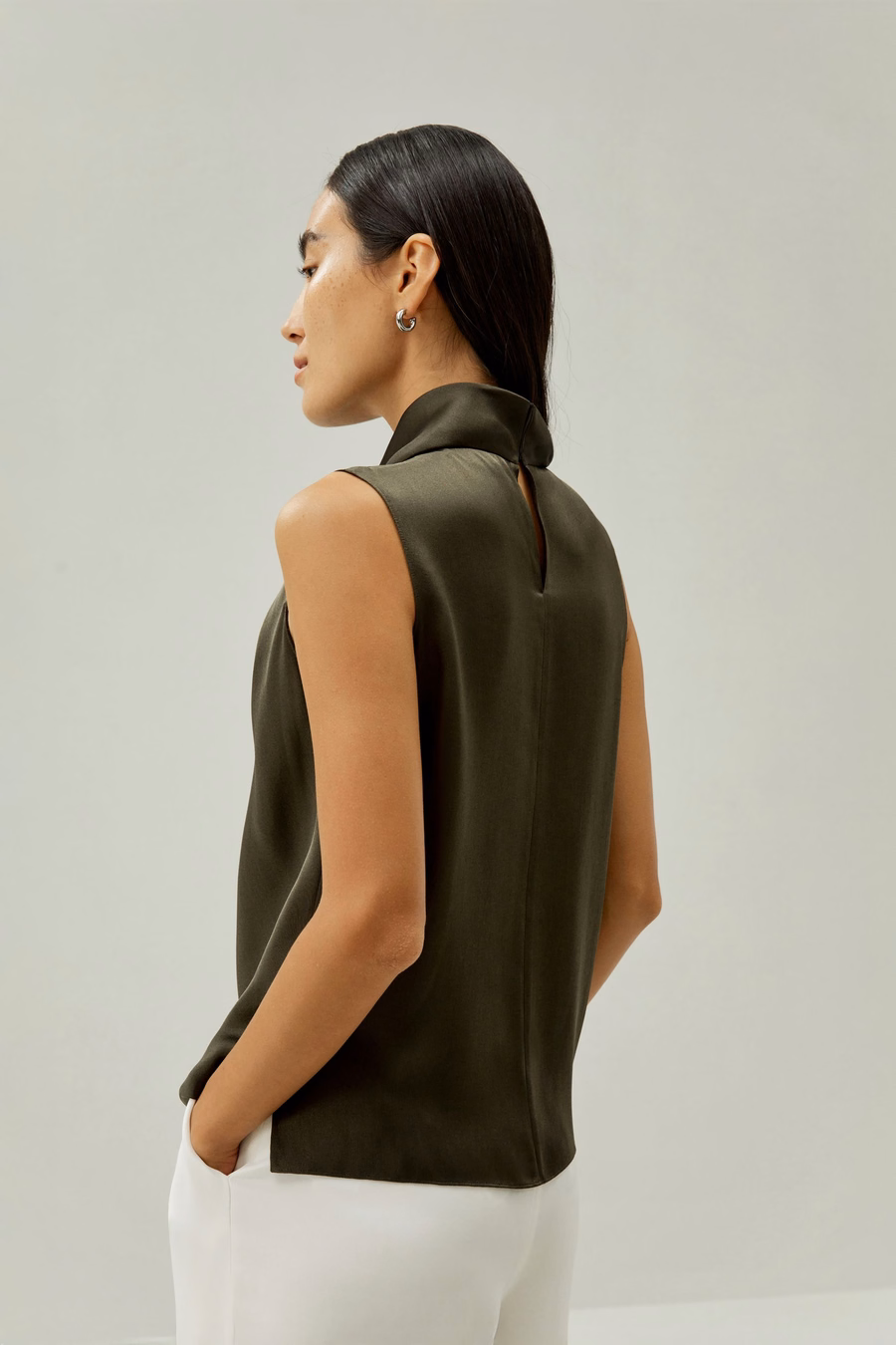 Asymmetrische mouwloze trui met kraag
